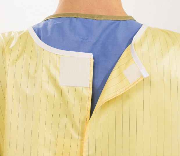 This shows the patented hook & loop closure at the top of the back of the EasyRelease® Isolation Gown.