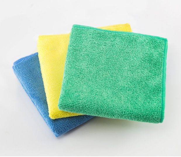 The all purpose microfiber cleaning cloth features a terry construction and are safer and cleaner than cotton. Removes 98%+ of bacteria from hard surfaces with just water. Featured in the stack are colors green, yellow, and blue.