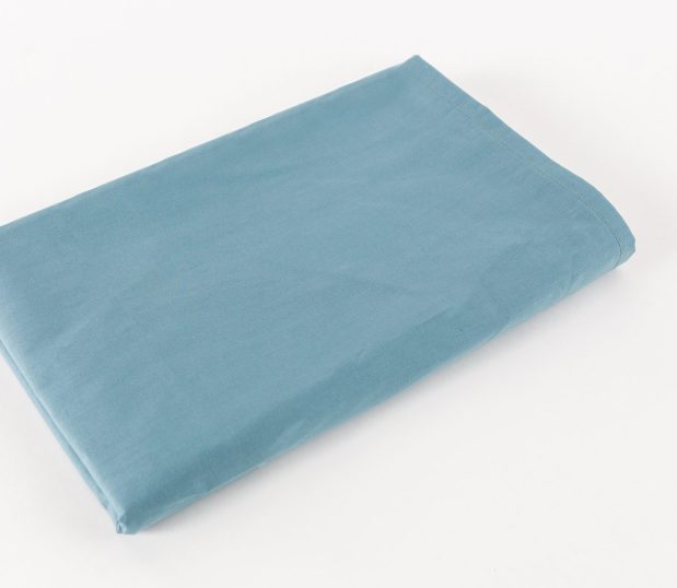 Standard Supreme Drape Sheets for hospitals and health systems for operating rooms. Shown folded in the color Ceil Blue.