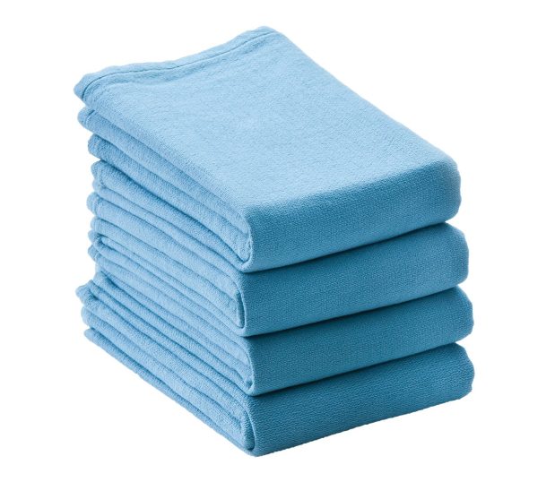 A folded stack of four of our SofSorb® Surgical Towels. These Ceil surgical towels are the lowest linting cotton surgical towel available.