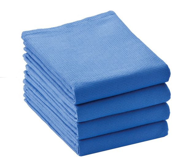 A stack of four of our ToughWeave® Surgical Huck Towels. These reusable surgical huck towels are compatible with processing and sterilization.