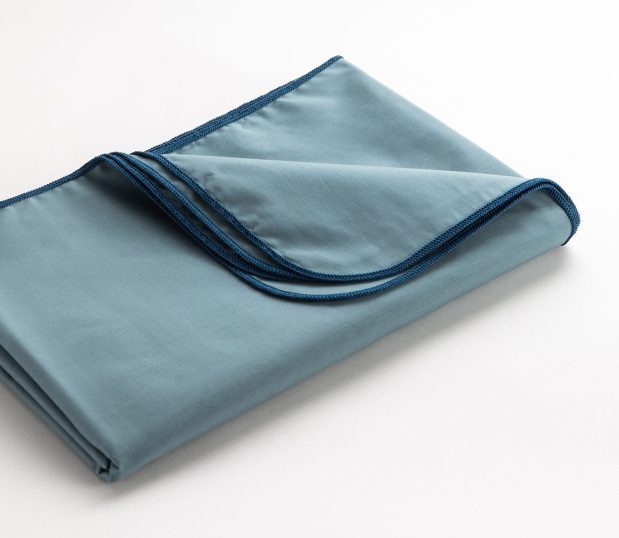 Folded image of the Standard Supreme Surgical Wrappers in Ceil. These surgical wrappers are are a reusable 2-ply, non-barrier solution for wrapping surgical instrument sets, instrument trays and textile packs.