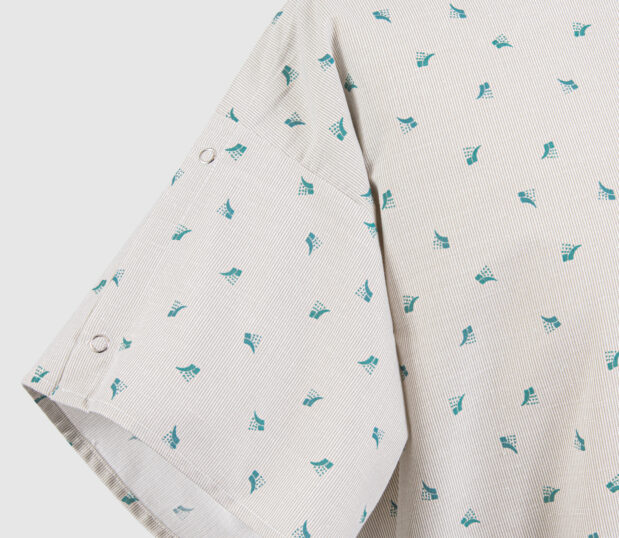 Detail of multipurpose patient gown in Nova Teal.