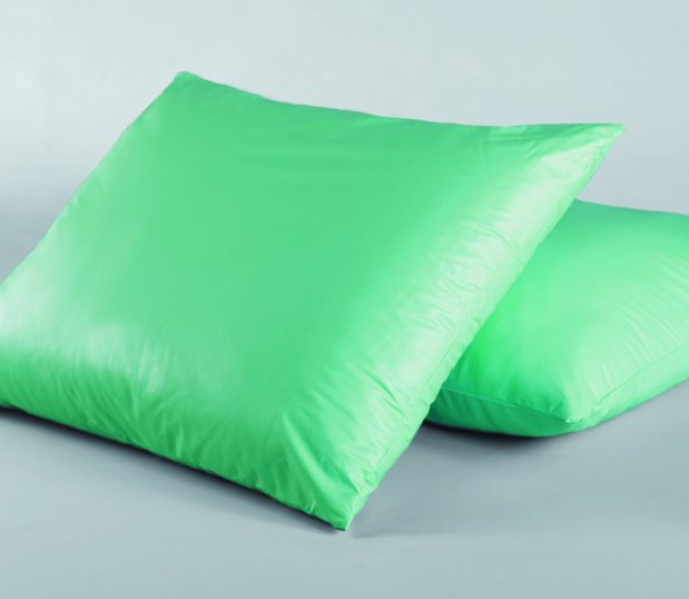 Two of the Beth® hospital pillows. In a bright green these are breathable healthcare pillows.