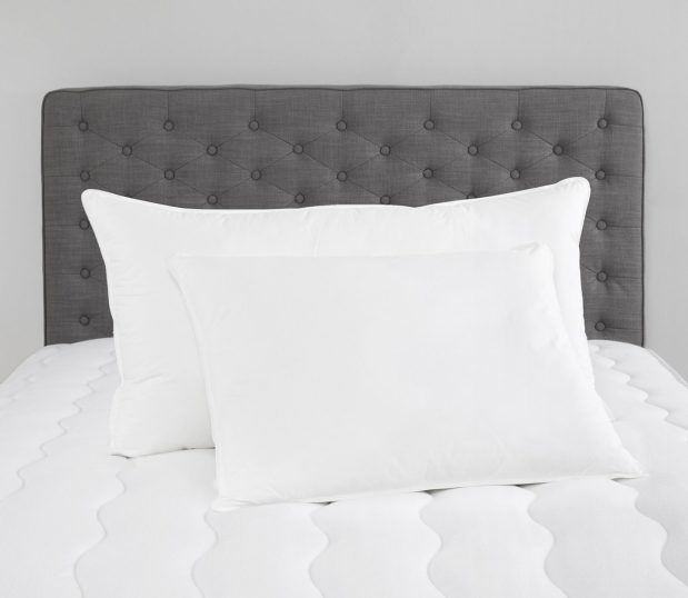 Image shows two Chambersoft pillows laying on a mattress.