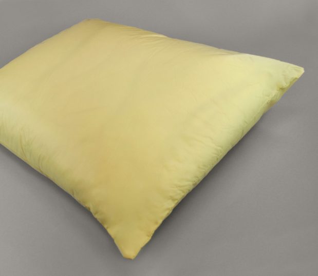 The Excel® Pillow is yellow. This Nylon Healthcare Pillow offers comfortable breathability and antimicrobial protection.