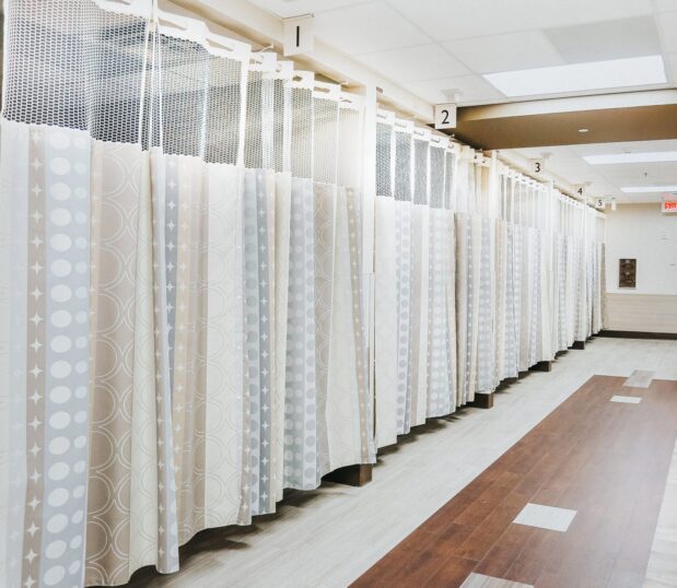 Custom Privacy Curtains shown in an emergency room. On the Right Track Privacy Curtains make an excellent choice for highly trafficked ERs.