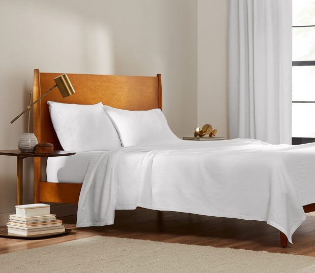 These tough, durable sheets deliver hotel quality comfort. Image shows our ComforTwill® sheets that will stay bright and soft, wash after wash on a hotel bed.
