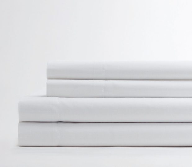 Crisp and cool, these soft percale sheets offer premium, breathable comfort perfect for warm summer nights. Make the switch to percale sheets today! Image shows a stack of percale sheets.
