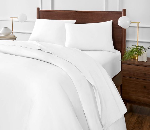 Paragon ™ 100% cotton sheets are made with BCI-certified cotton. These sustainable sheets are a responsible, yet luxuriously comfortable choice. Image shows luxe, Paragon Cotton sheets on a hotel bed.