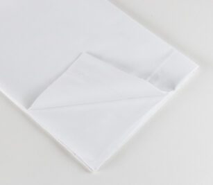 Standard Classic Percale Woven Sheeting for hospitals and healthcare systems. Available in flat sheets or pillowcases. Folded flat sheet shown.