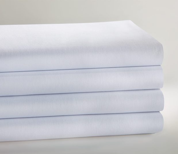 TruVal® Hospital Sheets. Shown in a stack of folded sheets.