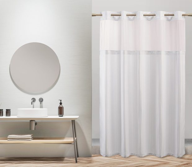 Ames Herringbone hookless shower curtain shown here in an upscale hotel bathroom.