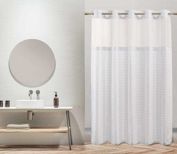 Bay Blocks hookless shower curtain shown here in an upscale hotel bathroom.