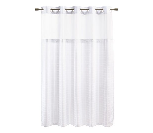 Full length silhouette of white hookless shower curtain in the Bay Blocks pattern. Shown hanging from a rod.