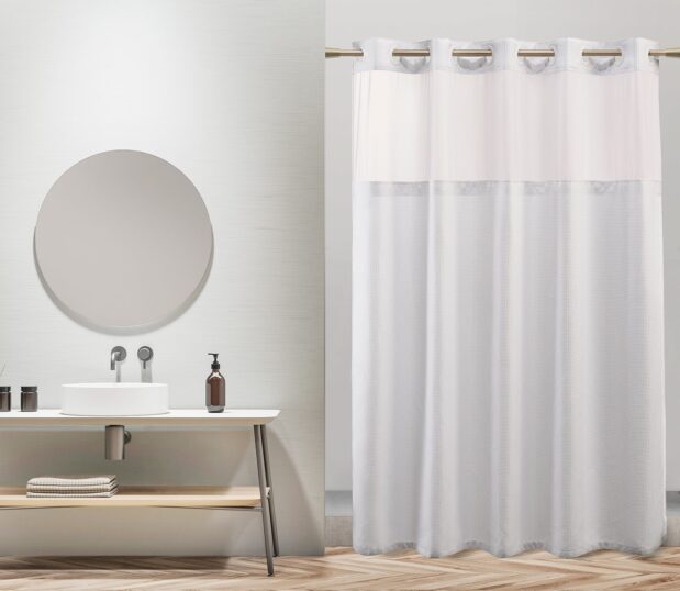 Luxe Waffle shower hookless curtain shown here in an upscale hotel bathroom.