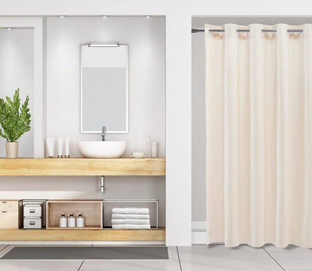 Beige Cruise Vinyl hookless shower curtain shown here in an upscale hotel bathroom.