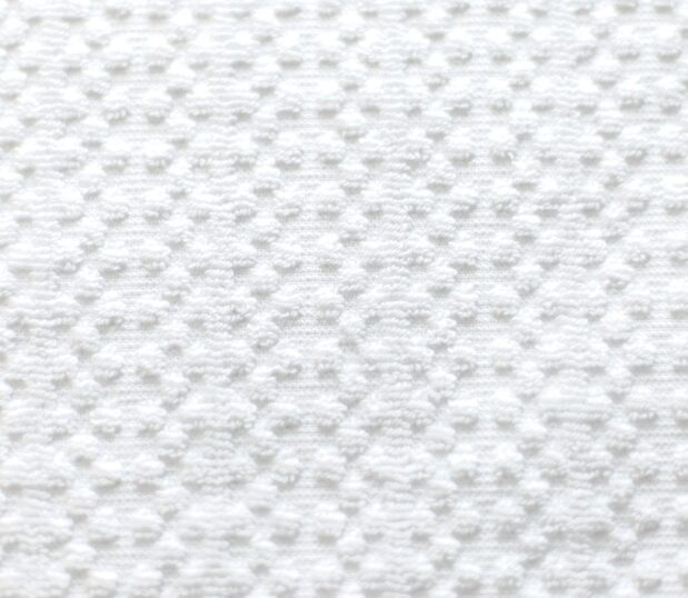 Detail of the Elevations towel, Rainfall, which is an alternating dot and stripe pattern.