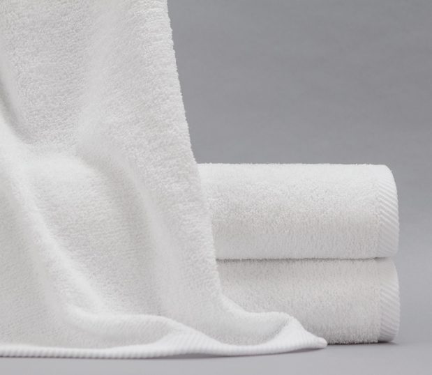 This is an image of the Gradient towel. The Gradient towel is different because it distributing weight from unused edges to the center of the towel giving the experience of a thicker towel without the weight and cost.