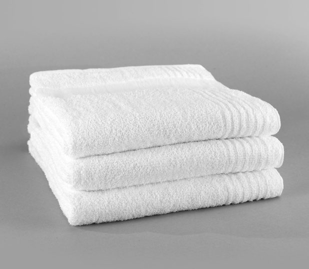 A stack of three folded PerVal® bath towels is shown here. These hospital towels are available in plain white or Hospital Property styles.
