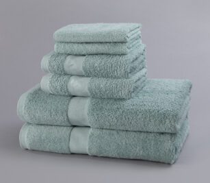 Our vat-dyed terry hospital towels are healthcare towels feature bright, long lasting color and softness. Featured here is a stack of Seafoam bath, hand and wash towels.