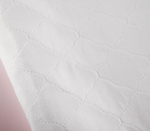 Birdseye Underpads featuring a scalloped diamond quilting pattern.