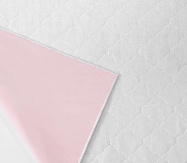 Ibex Underpads are ideal for facilities that experience high volume underpad usage. Shown here: a detail swatch image of the underpad.