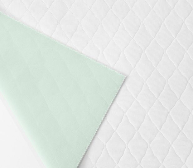 Our TruVal® Underpads are made from 100% synthetic materials, giving them superior durability. Laminated construction extends service life even further. A true value for hospitals and health systems! Shown here: a detail swatch of the underpad.