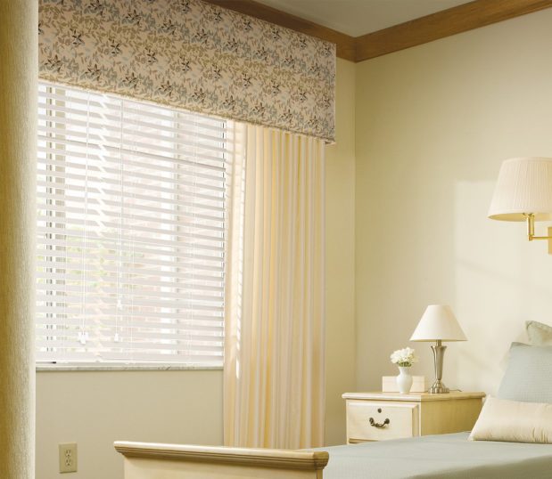 Over 40 fabric collections for cornices and top treatment applications are available. You can view them on our fabric gallery. This is a image feature a vance with curtains in a long-term care facility.