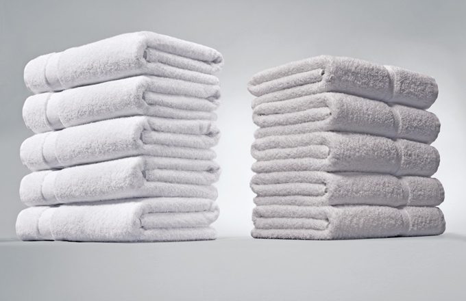 Two stacks of towels to show the difference with and without Centium Core Technology.