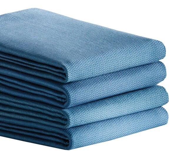 Traditional all-cotton, absorbent surgical towel available in 3 vat-dyed colors. Image shows a stack of our Absorbent Surgical OR Towels in Ceil blue.