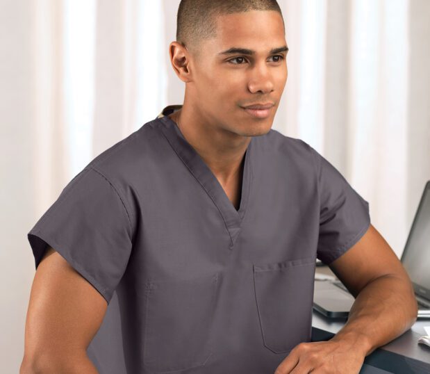 African American doctor wearing our Standard Classic Unisex Scrub Shirt in Harbor. These scrub shirts offer an excellent balance of performance and value.