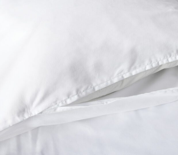 This is a detail image showing the classic center opening closure of the paragon cotton duvet cover.