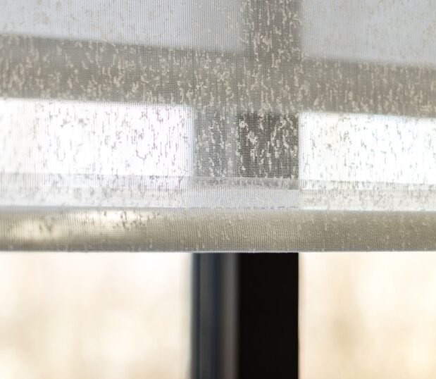 A close up detail shot of sheer fabric shades.