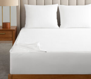 AllerEase® Platinum Mattress Encasement. Shown on a bed in an hotel environment.